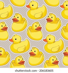 Vector seamless pattern with yellow ducks