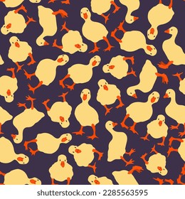 Vector seamless pattern with yellow goslings on dark violet background. Cute small farm birds. Farming concept.