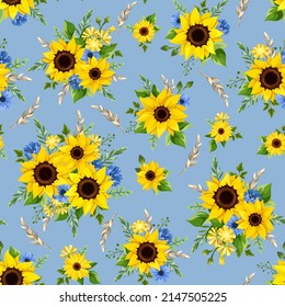 Vector seamless pattern with yellow sunflowers, blue cornflowers, and wheat ears on a blue background