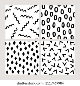 Vector seamless patterns set inspired by memphis style. Hand drawn abstract geometric backgrounds. Trendy textures with lines, zigzag, diamond, triangle, oval ring. 