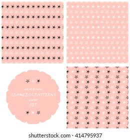 Vector Seamless patterns set. Stars. Hand drawn doodle stars. Stars seamless pattern. Tiny shining stars. Pink endless backgrounds with black and white stars
