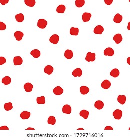 Vector seamless polka dots pattern in a chaotic manner. Hand drawn, doodle style. Design for fabric, wrapping, wallpaper, textile