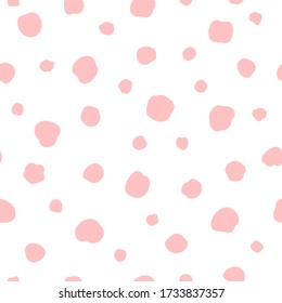 Vector seamless polka dots pattern in a chaotic manner. Hand drawn, doodle style. Design for fabric, wrapping, wallpaper, textile