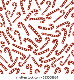 Vector seamless red striped Christmas candy canes on a white background