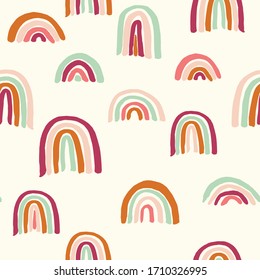 Vector seamless repeat pattern with sloppy thick hand drawn marker squiggly uneven rainbows in earthy indie modern mustard brown blush sage maroon colors half-drop on a cream ivory background