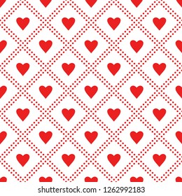 Vector seamless romantic pattern. Red hearts on white background. Perfect for wrapping paper or fabric. 