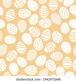Vector seamless simple drawing with decorative eggs. Easter holiday yellow background for printing on fabric, scrapbooking paper, gift wrapping and wallpaper. happy easter.