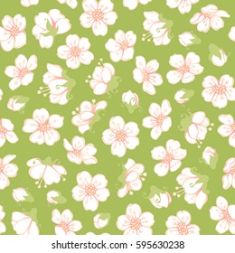 Vector seamless spring blossoms pattern. White fruit tree flowers on green background. Boundless background for your design.