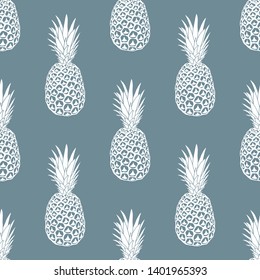 Vector seamless summer pattern. Pineapple on blue background