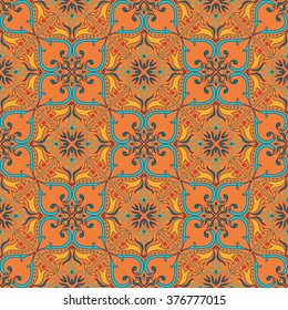 Vector seamless texture. Beautiful colored pattern for design and fashion with decorative elements. Portuguese tiles, Azulejo, Talavera, Moroccan ornaments in blue and orange colors