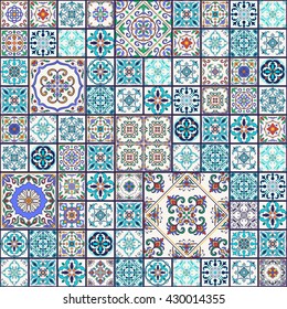 Vector seamless texture. Beautiful mega patchwork pattern for design and fashion with decorative elements. Portuguese tiles, Azulejo, Talavera; Moroccan ornaments in blue and orange colors