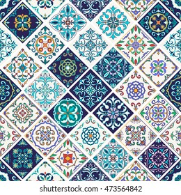 Vector seamless texture. Beautiful patchwork pattern for design and fashion with decorative elements. Portuguese tiles, Azulejo, Talavera, Moroccan ornaments