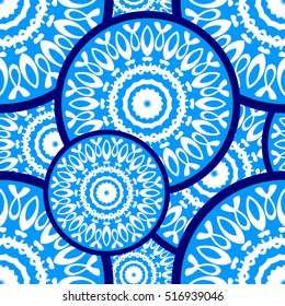 Vector seamless texture with a bright blue circular ornament. Background template for web design, wallpapers, covers, textile.