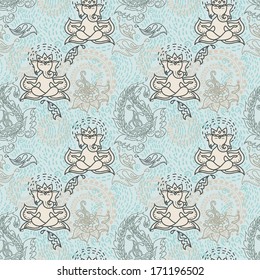 Vector seamless texture with cute ganesha and beautiful paisley ornament