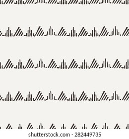 Vector seamless texture of hand-painted triangles