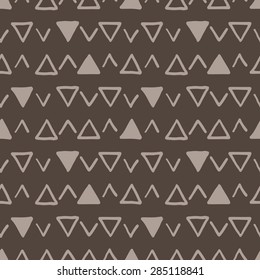 Vector seamless texture of hand-painted triangles