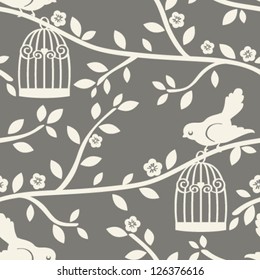 Vector seamless tree branch pattern with birds.