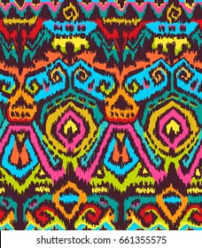 Vector Seamless Tribal Pattern in Scribble Style. Colorful Handicraft Ethnic Ornament. 
 Textile Design. Rough Edges Shapes