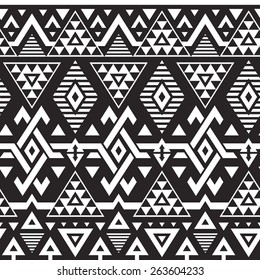 Vector Seamless Tribal Pattern for Textile Design. Black and White Ethnic Background with Triangles, Rhombus and Stripes