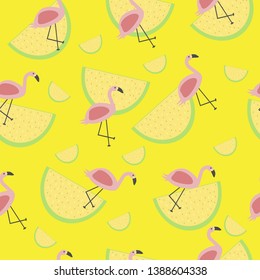 vector seamless tropical pattern with animal pink flamingo lemon slice dragon fruite and watermelon on a  yellow background for printing and textiles