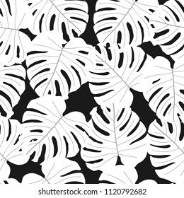 Vector seamless tropical pattern, bright tropical foliage, monstera leaves. Modern bright summer print design from thickets of tropical leaves from the jungle.