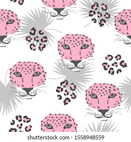 Vector seamless tropical pattern with leopard heads and palm leaves.