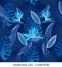 Vector seamless tropical pattern, vivid tropic foliage, with monstera leaf, palm leaves, bird of paradise flower. Pattern trend design.