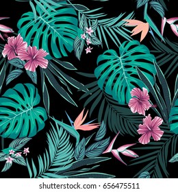 Vector seamless tropical pattern, vivid tropic foliage, with monstera leaf, palm leaves, bird of paradise flower, hibiscus in bloom. modern bright summer print design