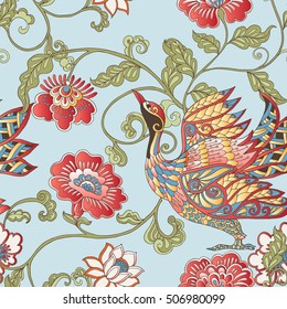 Vector seamless vintage floral pattern. Stylized silhouettes of flowers and berries on a blue background. Medieval, in rococo style, victorian style.