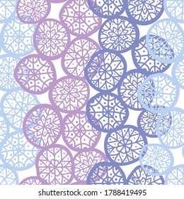 Vector seamless vintage pattern of circular shape pink snowflakes on light blue