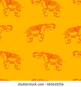 Vector seamless vintage pattern with ornamental indian Elephant. Hand drawn ethnic illustration with tribal elements for print, textile, wrapping and other seamless fashion boho design. Red on yellow.