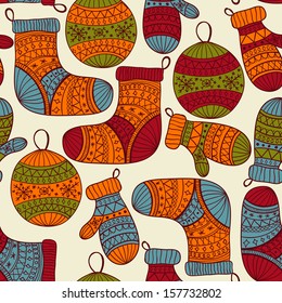 Vector seamless winter  Christmas pattern with socks, mittens, fir tree balls and snowflakes, pattern in swatch menu