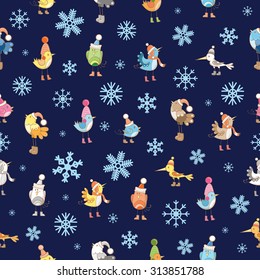 Vector seamless winter pattern with cute cartoon birdies in knitted caps on a blue background.