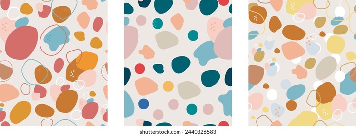 Vector Set of 3 abstract seamless patterns with different hand drawn shapes