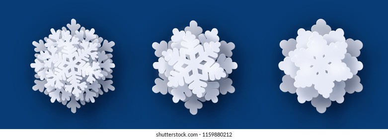 Vector set of 3 white Christmas paper cut 3d snowflakes with shadow on dark blue background. New year and Christmas design elements