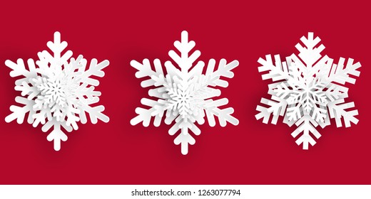 Vector set of 3 white Christmas paper cut 3d layered snowflakes with shadow on red background. New year and Christmas design elements.