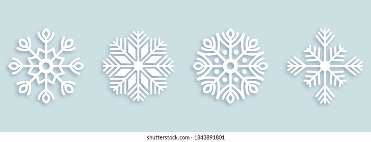 Vector set of 4 white Christmas paper cut snowflakes with shadow on white background. New year and Christmas design elements