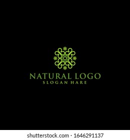 Conjunto de vectores de plantillas abstractas de diseño de logotipos verdes - emblemas para centros de medicina holística, clases de yoga, productos alimenticios naturales y orgánicos y envasado - círculos hechos con hojas y flores