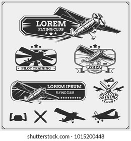 Vector set of airplane and helicopter emblems, labels, badges and design elements.