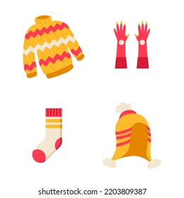 The vector set of autumn clothes. Coats, hats, gloves, and socks.Autumn icons  hand drawn vector