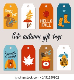 Vector set of autumn gift tags with squirrel, sweater, autumn plants and hand written phrases about autumn. Printable gift labels for fall season. Cute cartoon character. Journaling tags template.