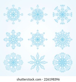 Vector set - beautiful blue snowflakes on light background. Use for snow/winter/Christmas texture. Use for embellishment, decoration - card, banners, label, web, webside, www, backdrop etc.  Eps 10.