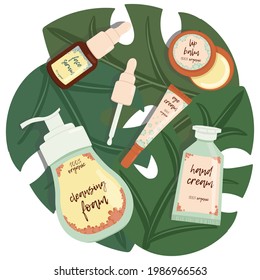 Vector set of beauty products: face serum, lip balm, eye cream, hand dcream and cleansing foam lying on tropical leaves