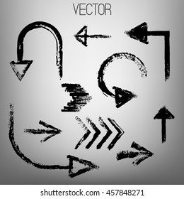 Vector set of black arrows painted buy dry brush. Grey gradient background. Ink.