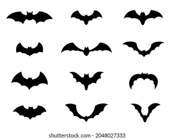 Vector set with black flying bats silhouettes.