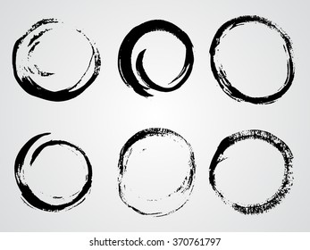 Vector set of black grunge watercolor round frames.