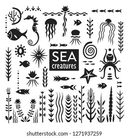 Vector set of black hand-drawn silhouettes of  sea creatures and weeds.