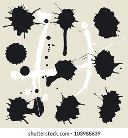Vector set of black ink stains on the beige background