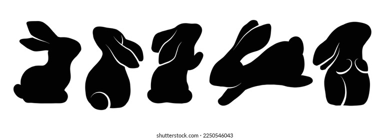 Vector set of black silhouettes of rabbits in various poses. Shadows of hares isolated from background. Animals for logos, icons and cards