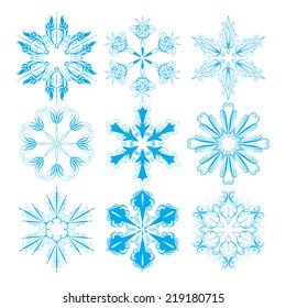 Vector set of  blue lace snowflakes for design Christmas backgrounds, cards, invitations.